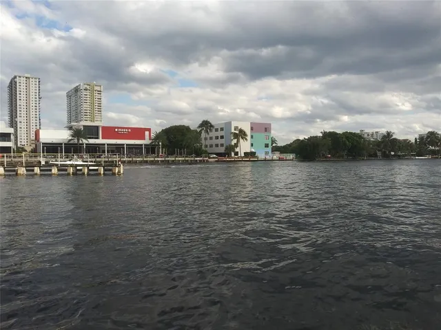 a view of a garden and swimming pool