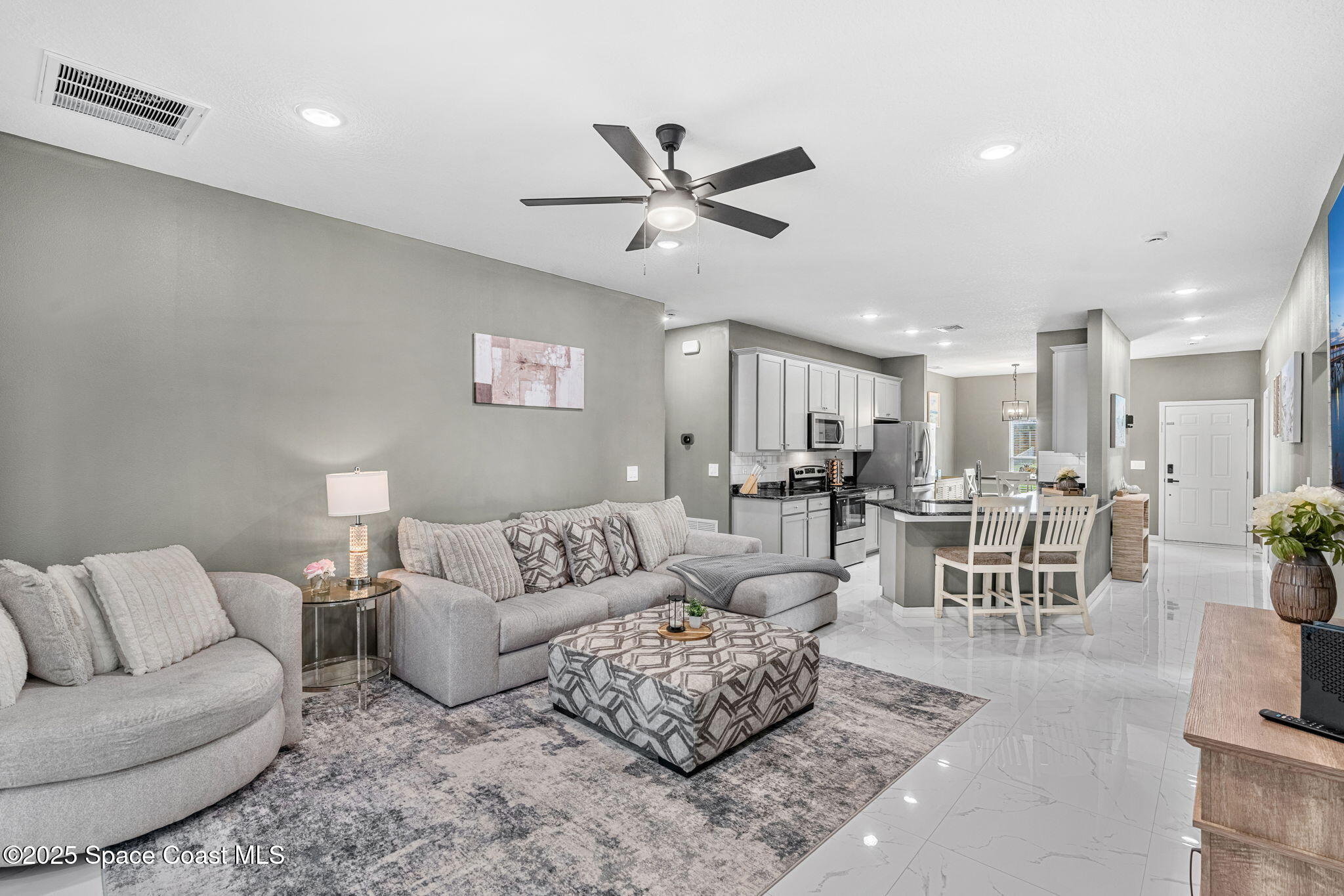 1125 Satin Road Palm Bay, FL 32908 - Photo 13 of 26 a living room with furniture