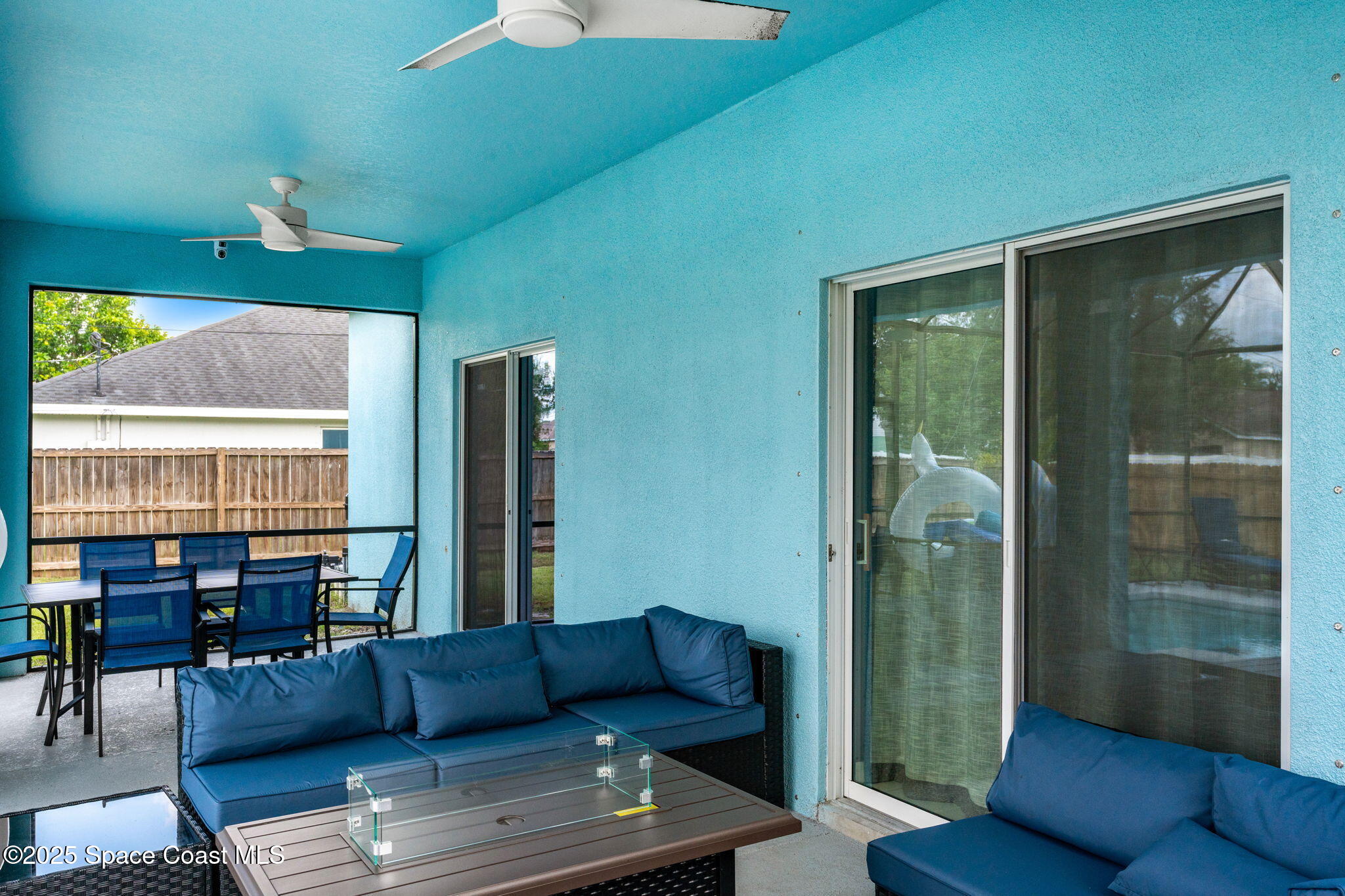 1125 Satin Road Palm Bay, FL 32908 - Photo 25 of 26 a living room with furniture and a large window