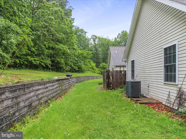 a view of a chairs with wooden floor