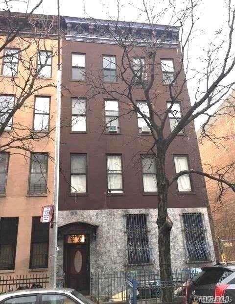 306 East 105th Street, Unit 2B Manhattan, NY 10029 - Photo 1 of 1 a view of a building