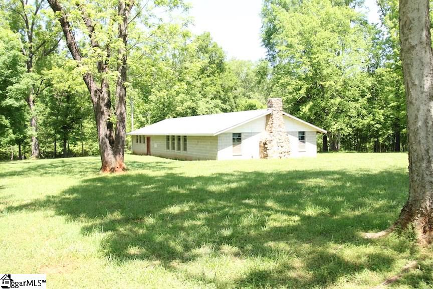 2364 County Line Road Cross Hill, SC 29332 - Photo 18 of 35 30 x 65 "Lodge" Building with stone fireplace, 'his and her' baths, kitchenette.