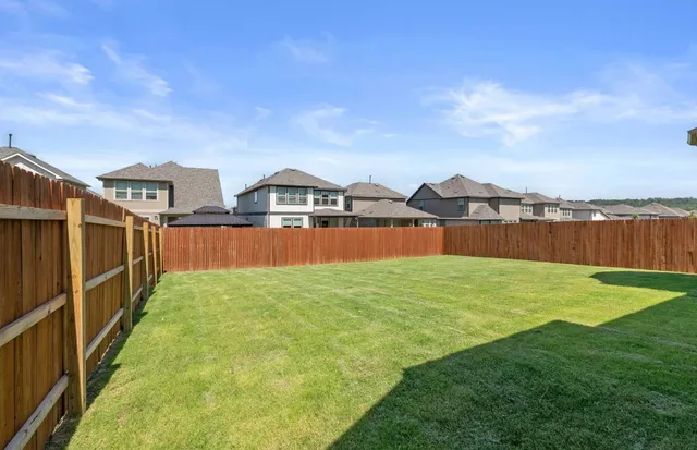 a view of outdoor space with backyard