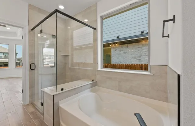 a kitchen with white cabinets and sink