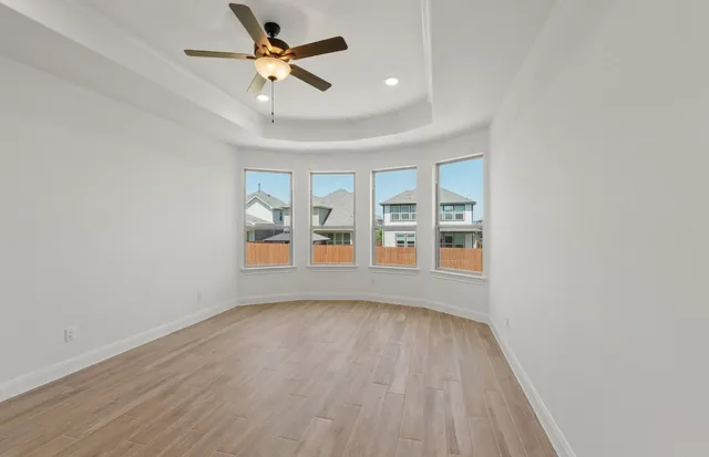 a bathroom with a tub and a shower
