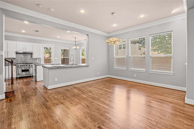 a view of a kitchen with furniture and a window