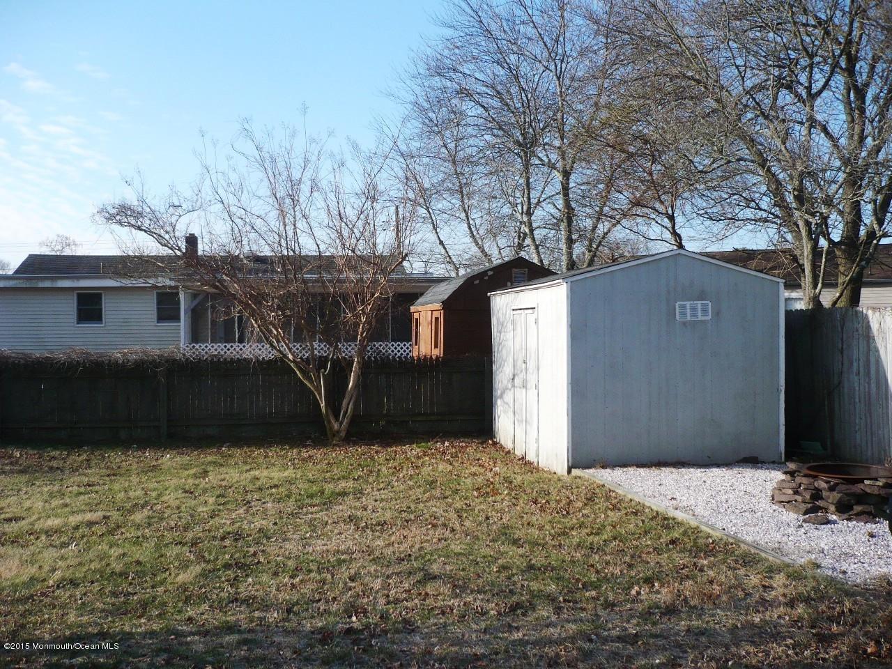 319 Stinson Road Brick, NJ 08723 - Photo 11 of 11 a front view of house with yard