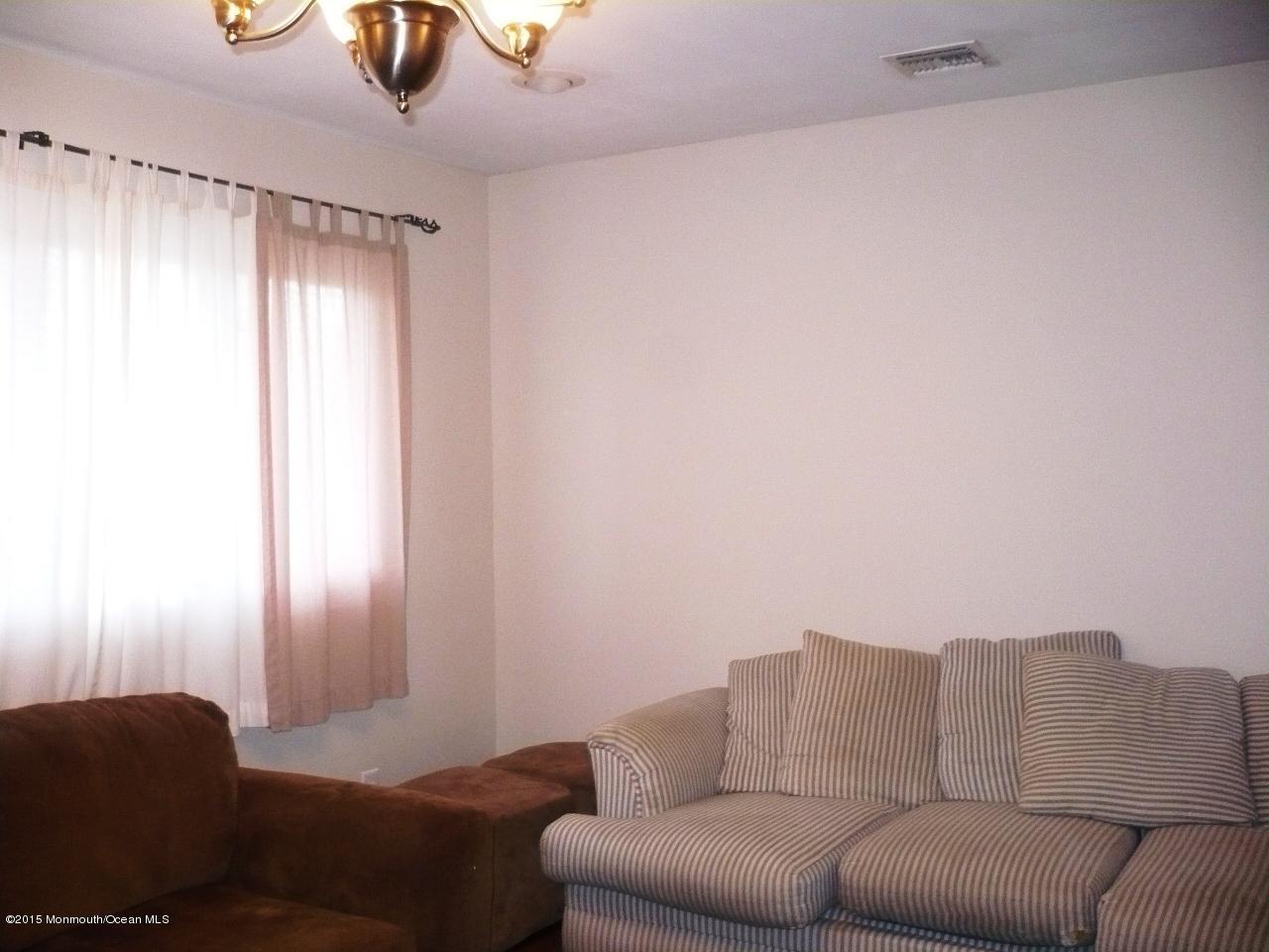 319 Stinson Road Brick, NJ 08723 - Photo 7 of 11 a living room with furniture