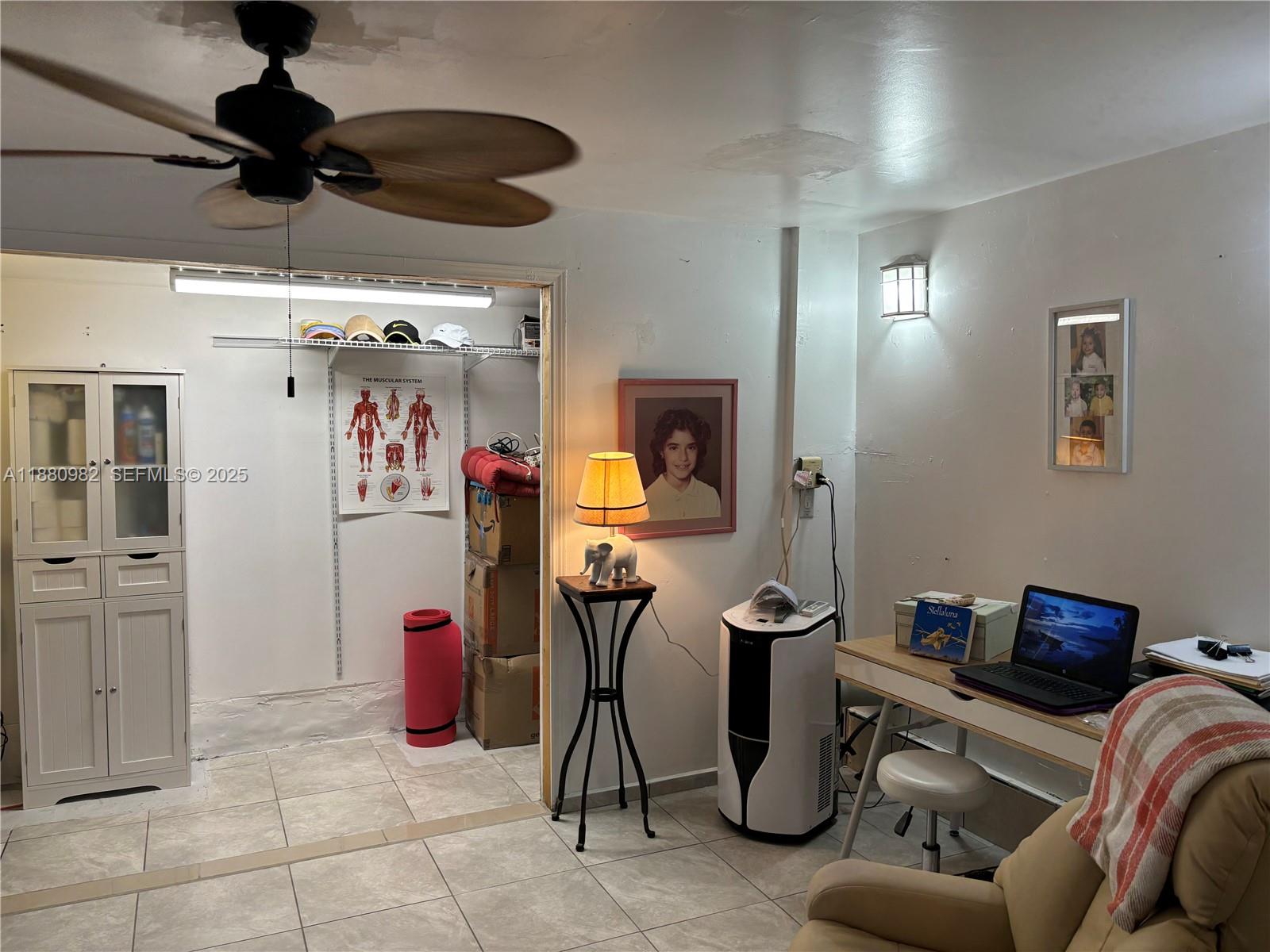 12343 Southwest 195th Terrace Miami, FL 33177 - Photo 16 of 45 a view of a room with gym equipment