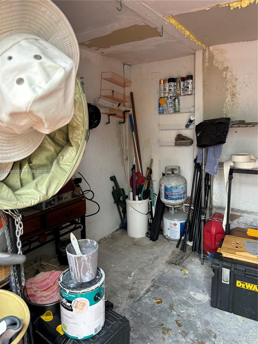 12343 Southwest 195th Terrace Miami, FL 33177 - Photo 34 of 45 a living room with furniture and a fireplace