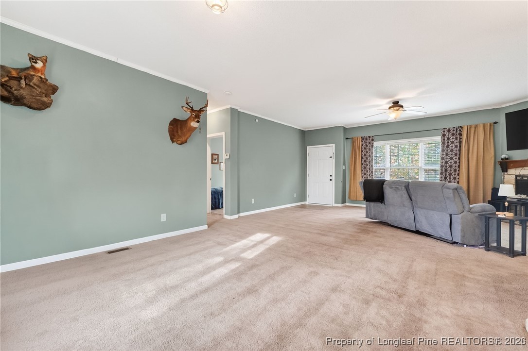 121 Prairie Lane Lillington, NC 27546 - Photo 11 of 40 a view of an empty room with a window