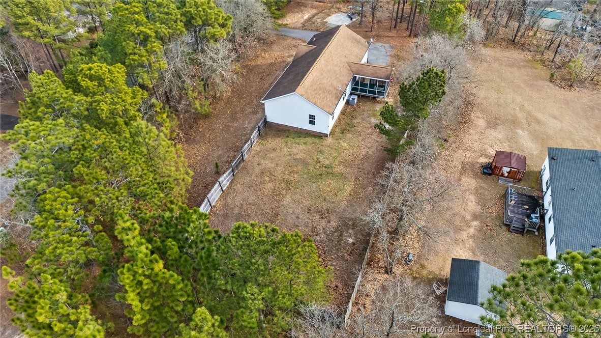 121 Prairie Lane Lillington, NC 27546 - Photo 32 of 40 an aerial view of a house with a yard