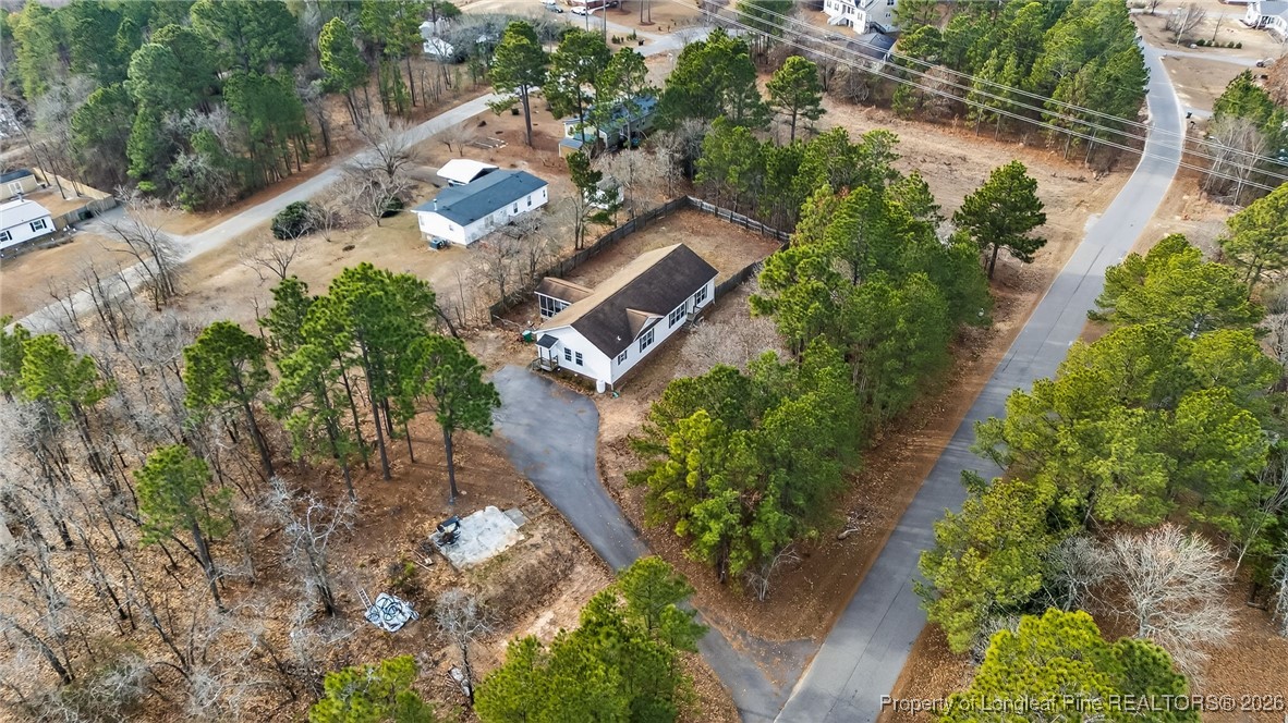 121 Prairie Lane Lillington, NC 27546 - Photo 33 of 40 an aerial view of a house with a yard
