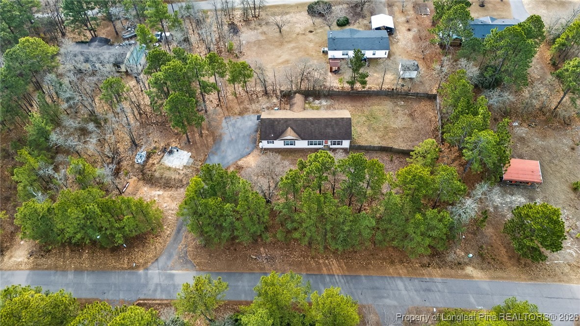 121 Prairie Lane Lillington, NC 27546 - Photo 34 of 40 an aerial view of a house with a yard