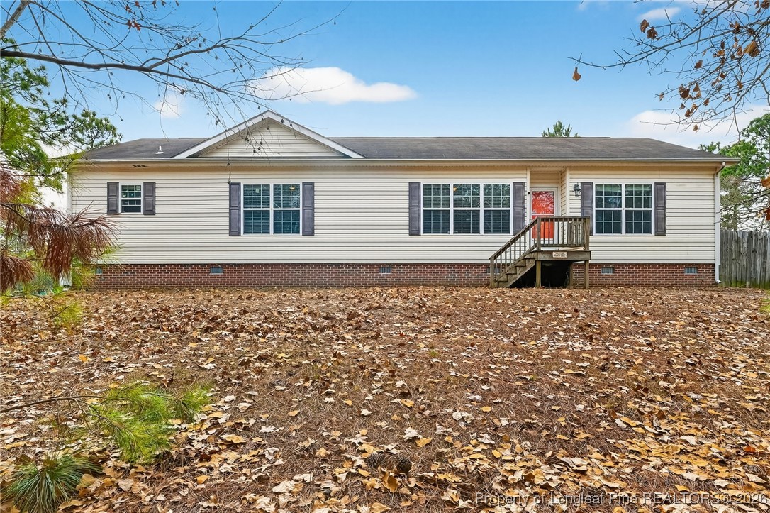 121 Prairie Lane Lillington, NC 27546 - Photo 39 of 40 front view of a house with a porch