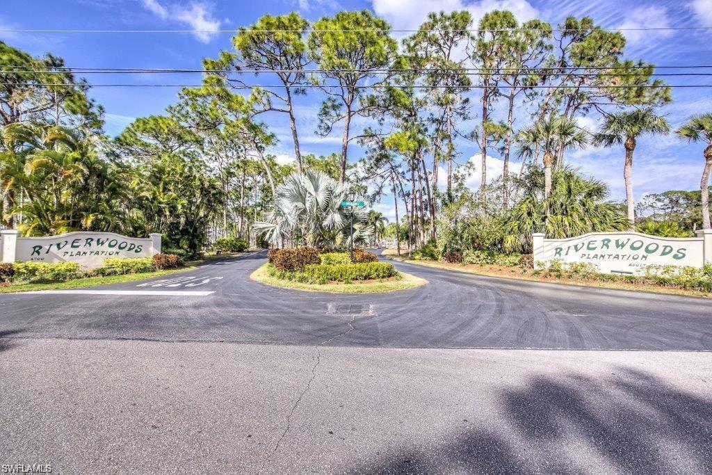 4671 Washington Way West Estero, FL 33928 - Photo 1 of 1 a view of a street with a building in the background