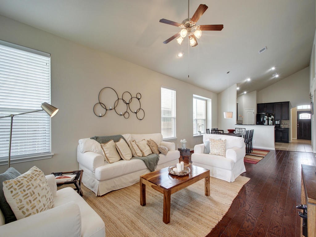 13900 Marathon Road Austin, TX 78717 - Photo 29 of 30 Photo of when owner lived in the home, the open floor plan is inviting and great for enjoying time in the living and dining spaces.