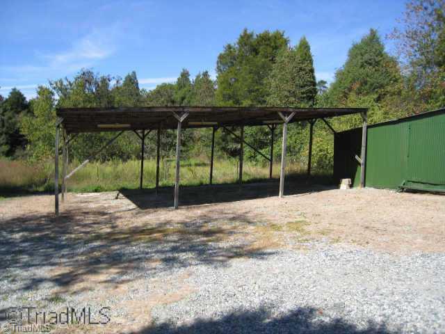 864 Wilson Road Linwood, NC 27299 - Photo 8 of 9 Other. Carpot and sheds