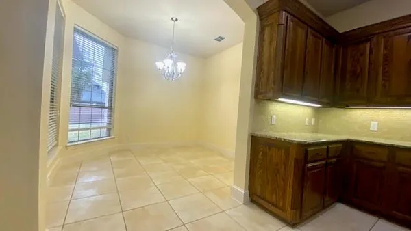 a bathroom with a tub and a shower