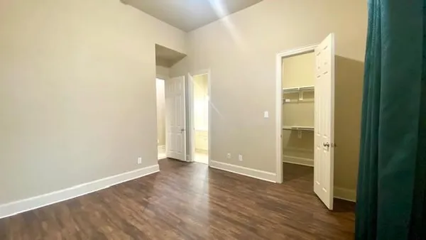 a view of a house with a yard and garage