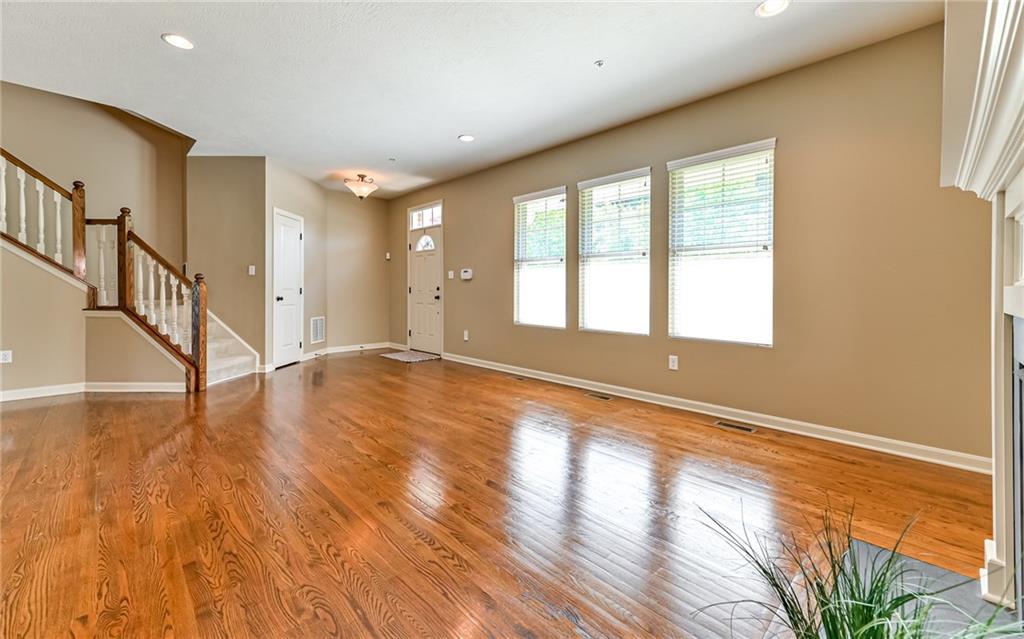 113 Shenot Road Wexford, PA 15090 - Photo 2 of 18 Light and bright living room features coat closet, recessed lighting and gleaming hardwood floors.
