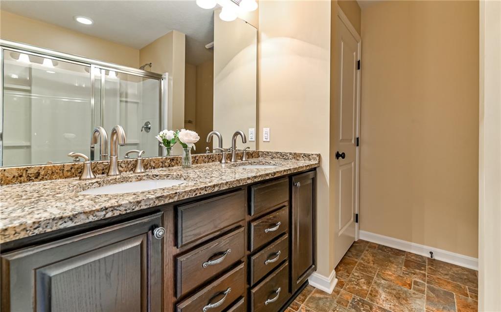 113 Shenot Road Wexford, PA 15090 - Photo 13 of 18 On suite master bathroom with double bowl vanity and granite sink top, linen closet and step in shower.