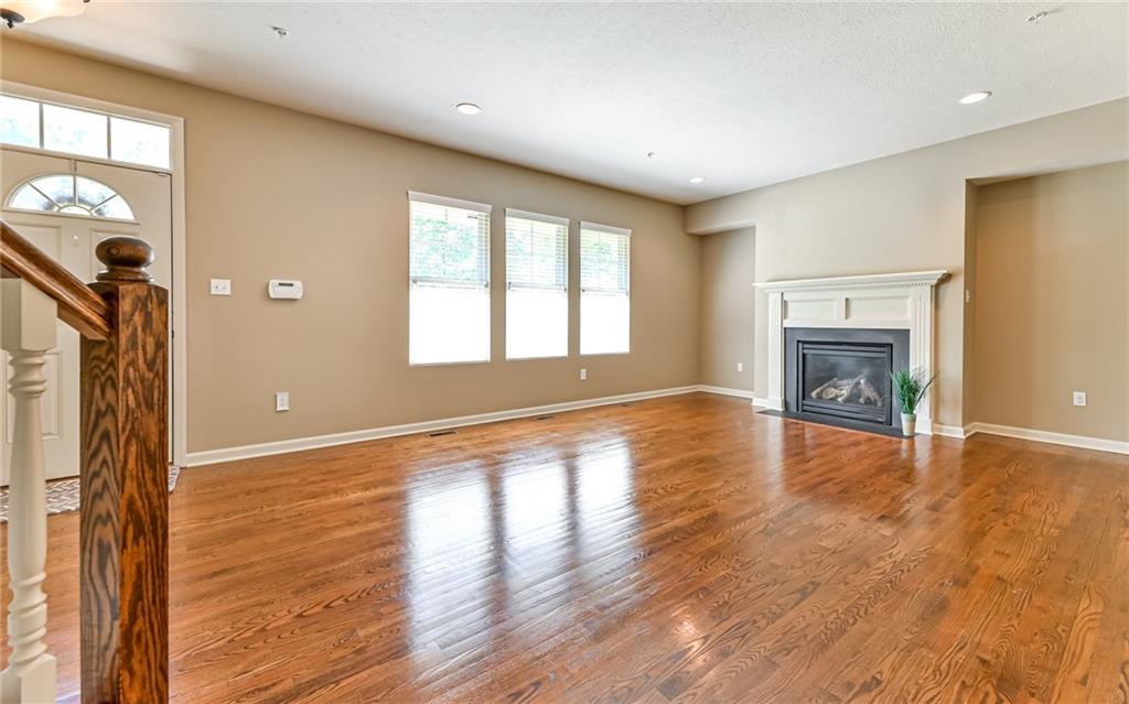 113 Shenot Road Wexford, PA 15090 - Photo 3 of 18 Large living room boasts cozy gas log fireplace.