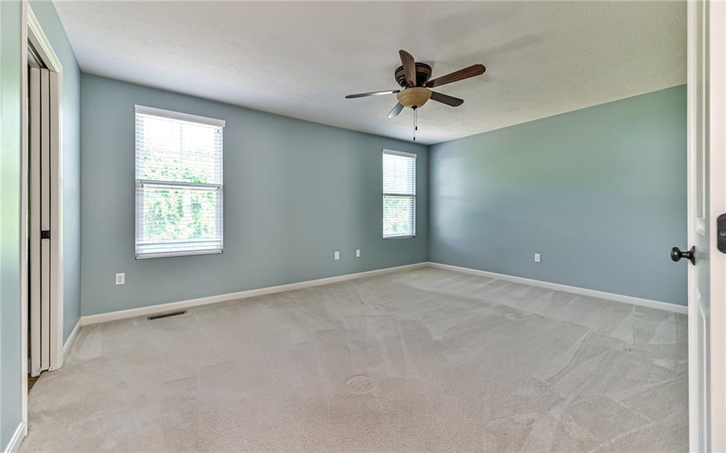 113 Shenot Road Wexford, PA 15090 - Photo 10 of 18 Generous sized master bedroom with ceiling fan and overhead lighting.