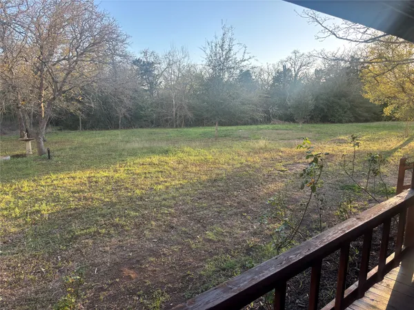 a view of a lake from a balcony