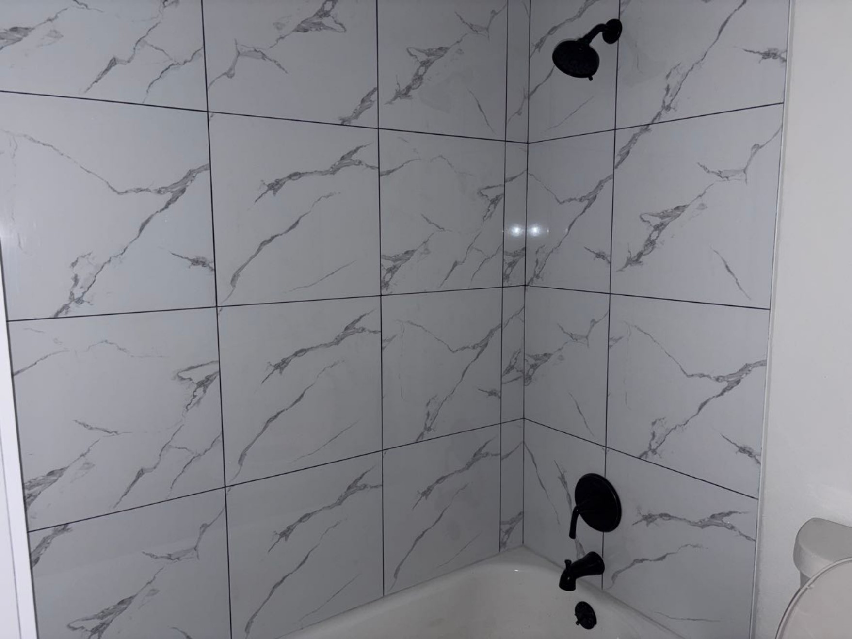 5782 Belcrest Street Houston, TX 77033 - Photo 14 of 18 a bathroom with a shower