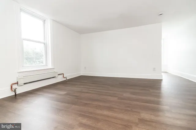 a view of a backyard of the house