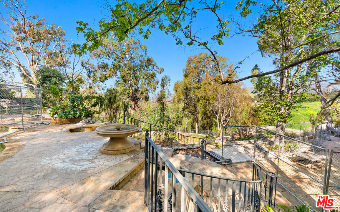 6611 Portshead Road Malibu, CA 90265 - Photo 13 of 19 a view of a backyard of the house