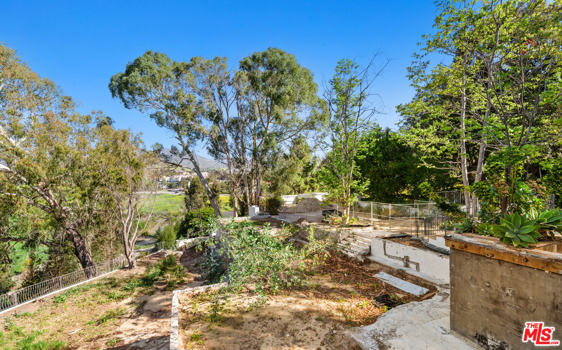 6611 Portshead Road Malibu, CA 90265 - Photo 15 of 19 a view of a yard with plants