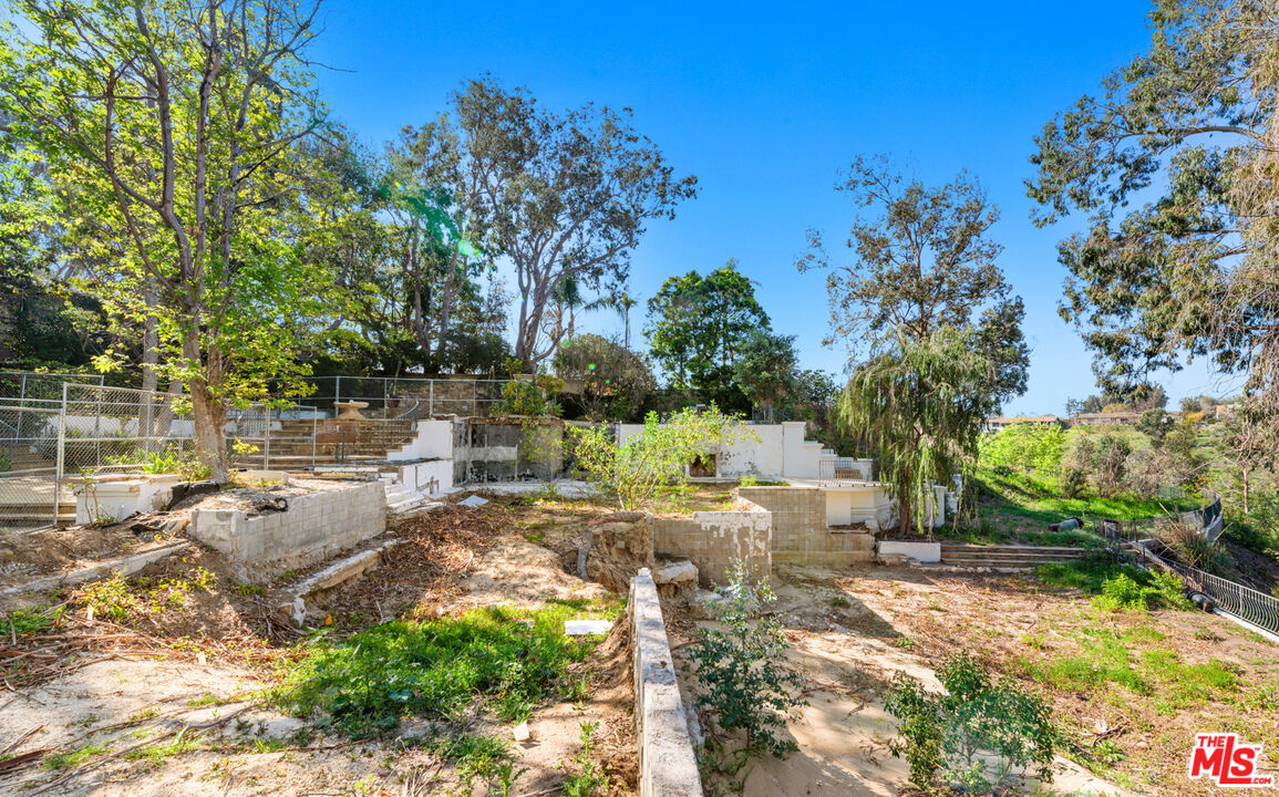 6611 Portshead Road Malibu, CA 90265 - Photo 17 of 19 a view of backyard with a garden