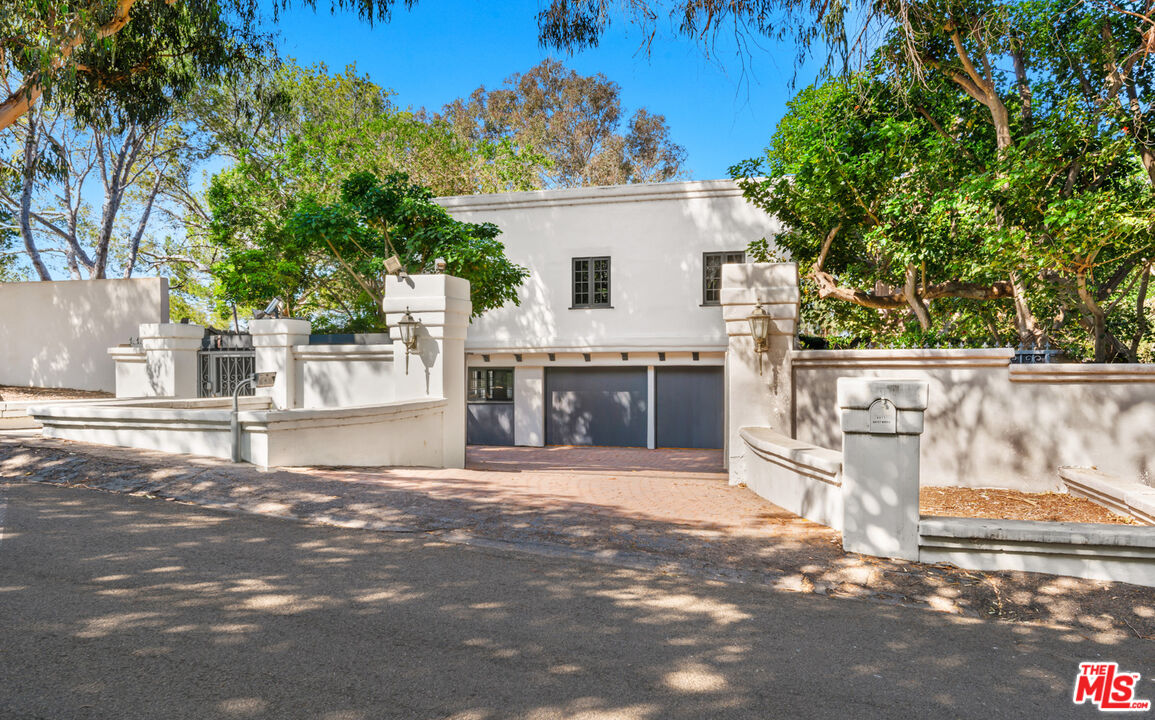 6611 Portshead Road Malibu, CA 90265 - Photo 2 of 19 a view of a house with a outdoor space