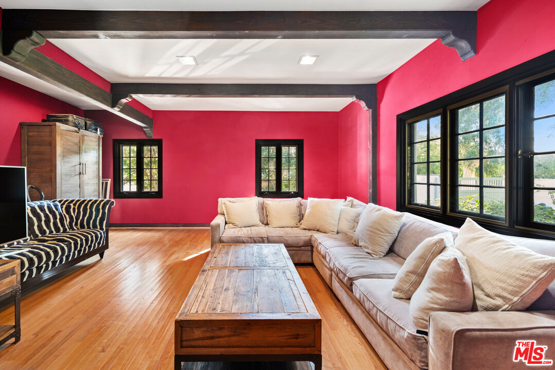 6611 Portshead Road Malibu, CA 90265 - Photo 8 of 19 a bed room with a bed and a couch