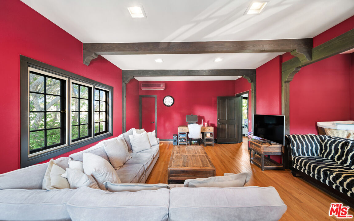 6611 Portshead Road Malibu, CA 90265 - Photo 9 of 19 a living room with furniture and a large window
