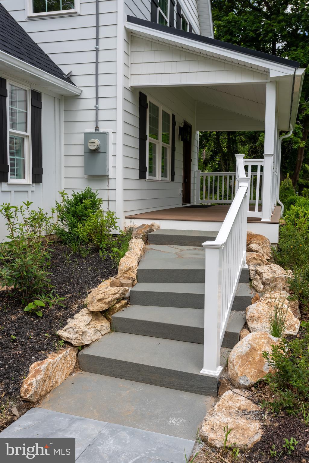 670 Leopard Road Berwyn, PA 19312 - Photo 4 of 52 a view of a house with entryway and potted plants