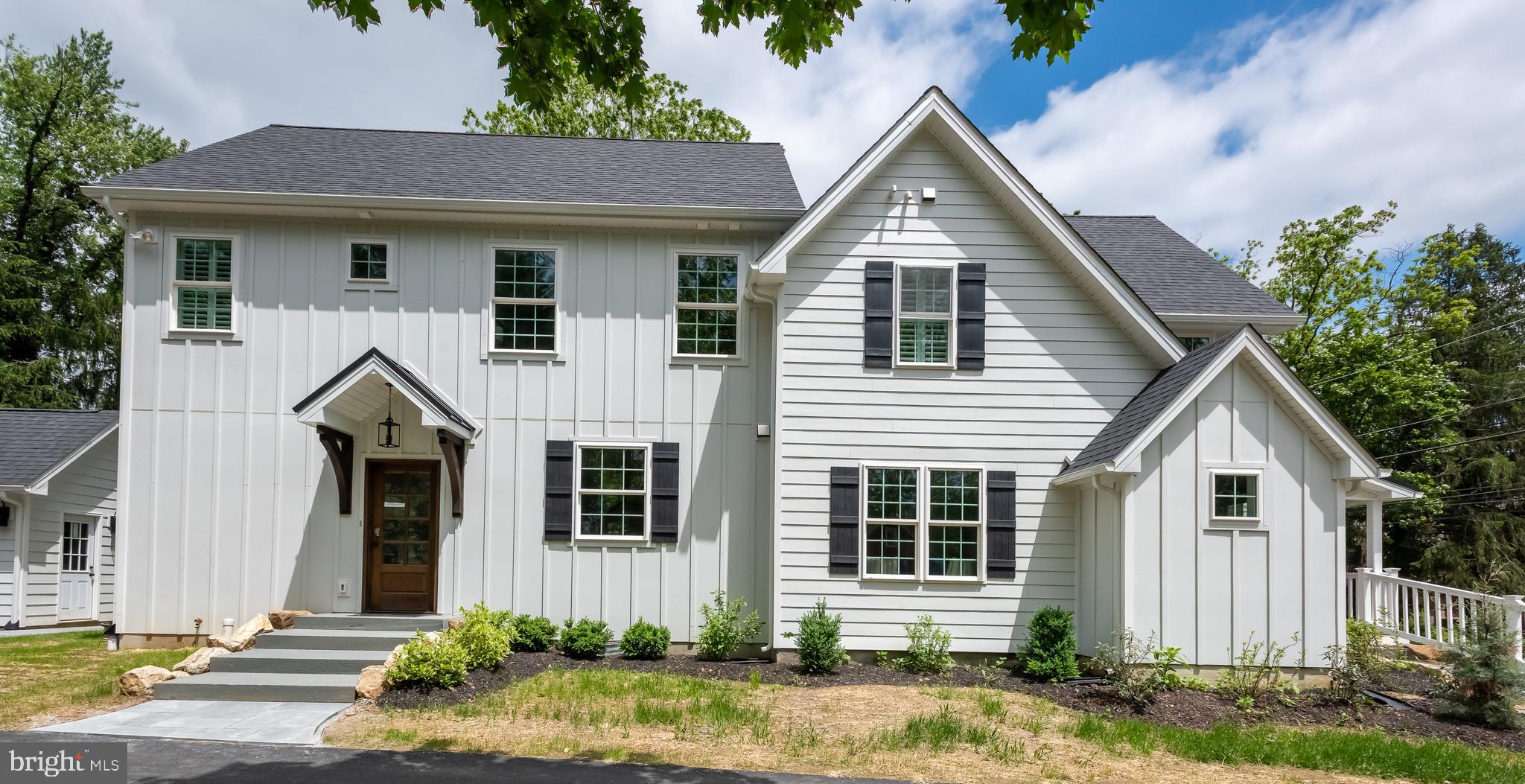 670 Leopard Road Berwyn, PA 19312 - Photo 6 of 52 a front view of a house with a yard