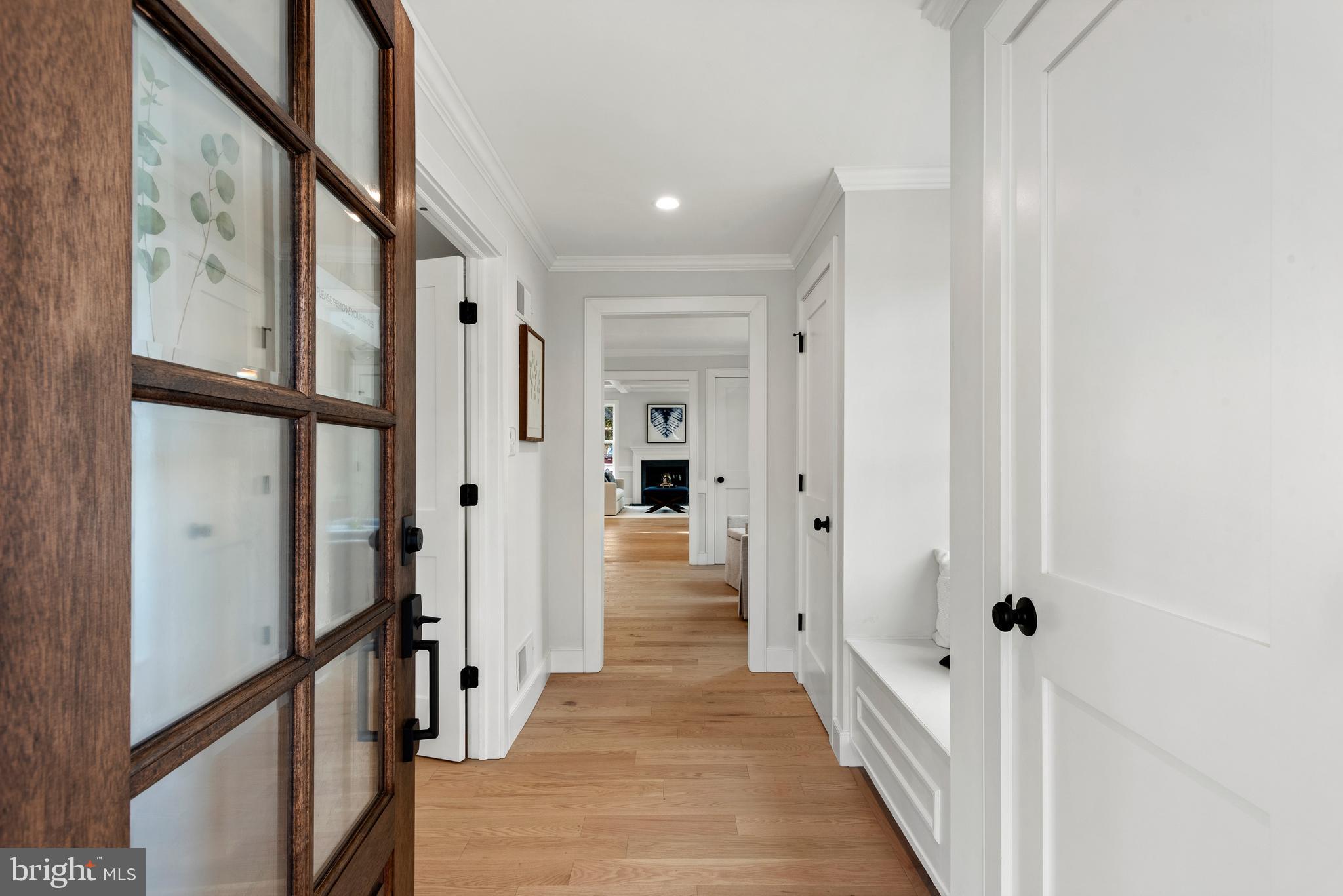 670 Leopard Road Berwyn, PA 19312 - Photo 8 of 52 a view of a hallway with wooden floors and staircase