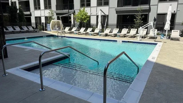 a view of a patio with a chairs and table in a patio