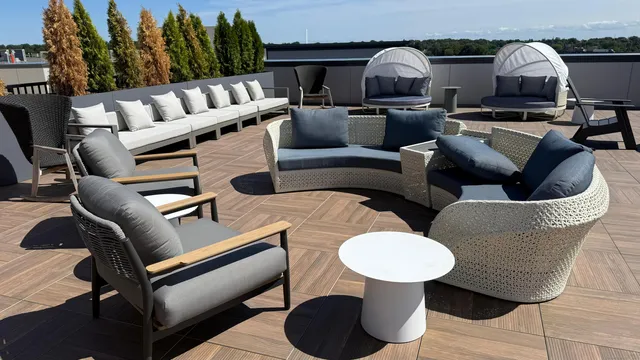 a terrace of a house with outdoor seating