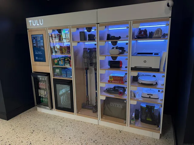 a view of a entryway door with wooden floor