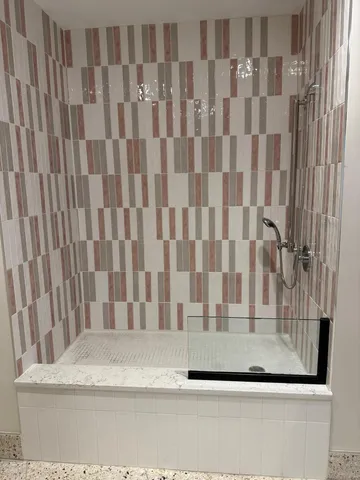 a bathroom with a bathtub