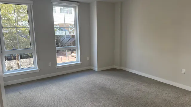 an empty room with windows