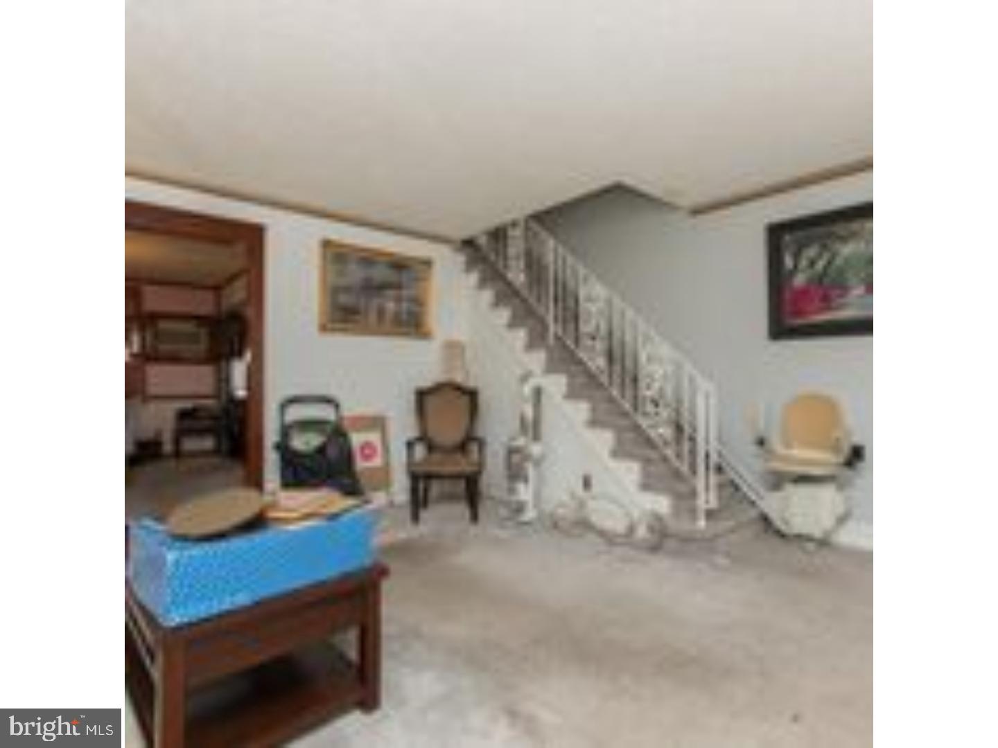 225 Barrington Road Upper Darby, PA 19082 - Photo 3 of 15 a living room with furniture and a wooden floor