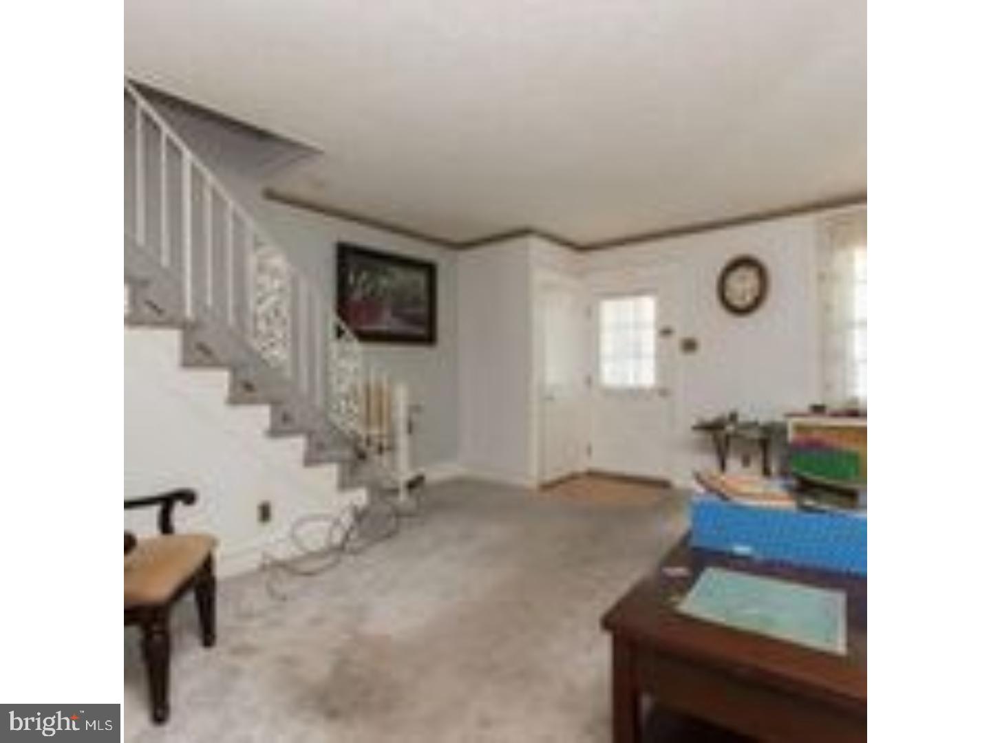 225 Barrington Road Upper Darby, PA 19082 - Photo 4 of 15 a living room with furniture and a flat screen tv