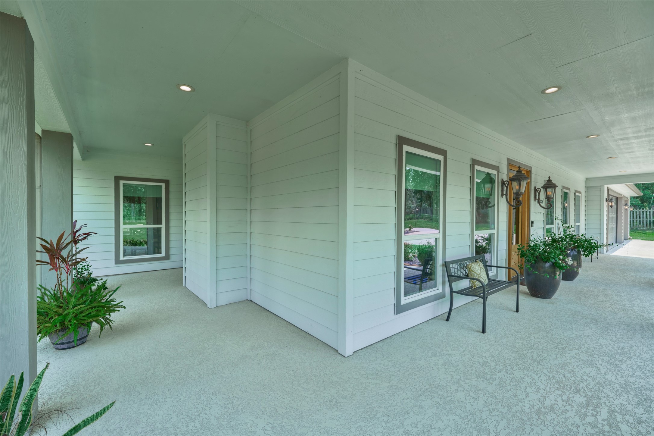 2218 Honea Egypt Road Magnolia, TX 77354 - Photo 6 of 50 Inviting Covered Porch