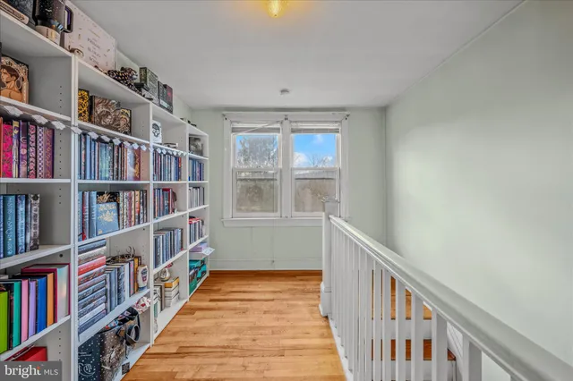 a view of a patio with table and chairs with wooden floor