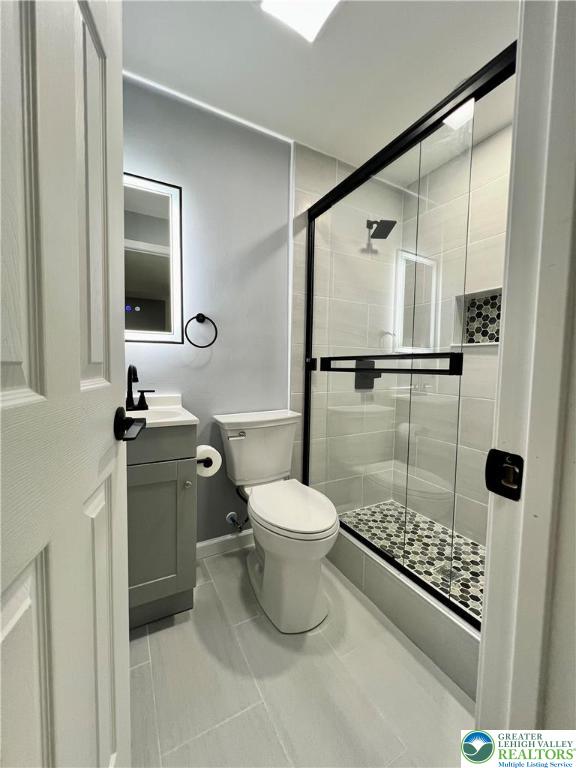 1066 Devonshire Road Allentown, PA 18103 - Photo 16 of 20 a bathroom with a toilet sink and shower